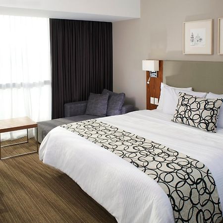 Casa Inn Premium Hotel Queretaro Miranda Kültér fotó A bed runner