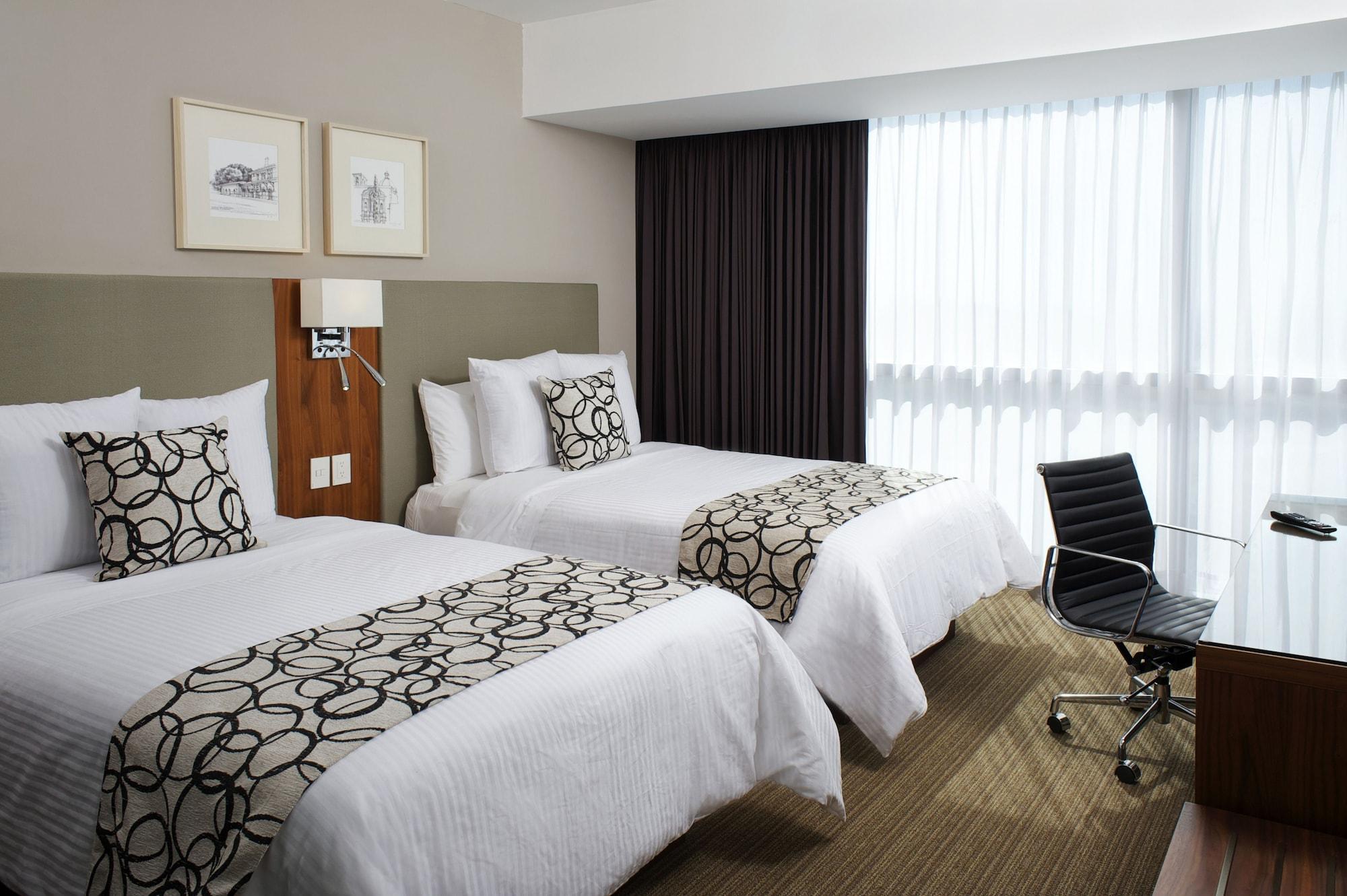 Casa Inn Premium Hotel Queretaro Miranda Kültér fotó A room at the hotel